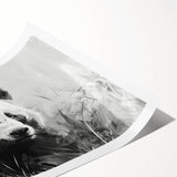 Rolled print showcasing a whimsical panda bear design in vibrant colors, ideal for children's room decor, packaged securely in a durable tube for easy shipping.