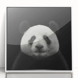 Framed wall art featuring a whimsical panda bear design in a white frame, showcasing vibrant colors and playful details, ideal for children's room decor.
