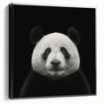 Framed black canvas wall art showcasing a whimsical panda bear design, perfect for children's decor, emphasizing playful colors and unique artistry.