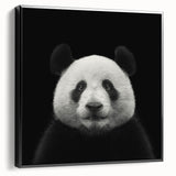 Framed black canvas wall art showcasing a whimsical panda bear design, perfect for children's decor, emphasizing playful colors and unique artistry.