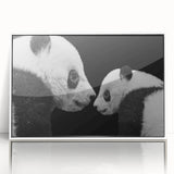 Framed wall art collection featuring a playful panda bear design on a white background, showcasing vibrant colors and modern aesthetics, perfect for children's room decor.