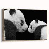 Framed wall art showcasing a stylish panda bear design on canvas, featuring a gold frame and a side view that highlights its elegance and vibrant colors. Perfect for adding a modern touch to any home decor.