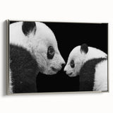 Framed canvas wall art featuring a playful panda bear design in a silver frame, showcasing vibrant colors and intricate details, ideal for children's decor.