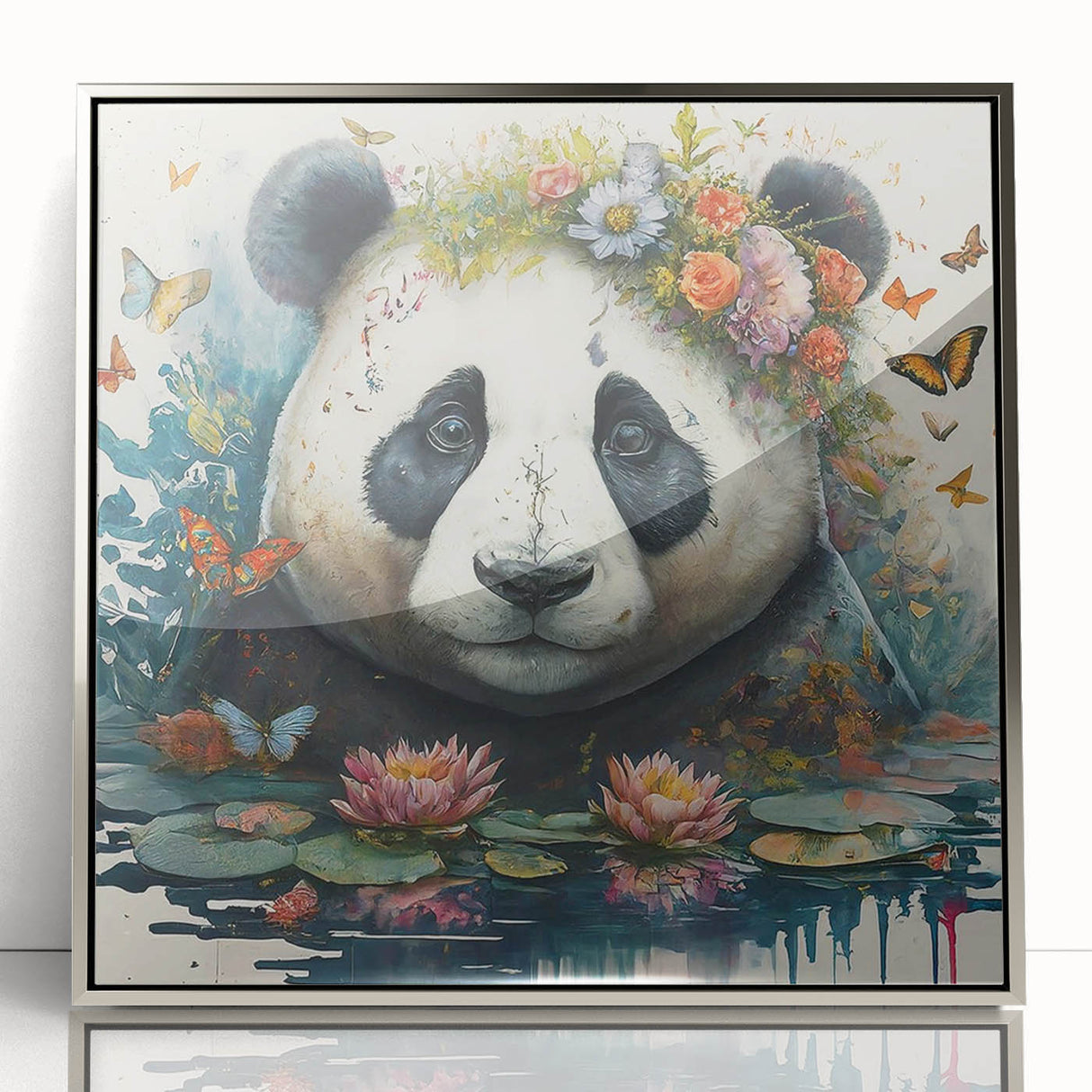 Framed wall art featuring a playful panda design with a silver acrylic front, perfect for children's rooms or playful decor. Ideal for adding a whimsical touch to any space.