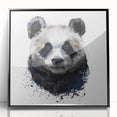 Framed wall art showcasing a playful panda bear design, featuring vibrant colors and a sleek black frame, ideal for children's decor or animal lovers.
