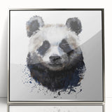 Framed wall art featuring a striking bear and panda design in vibrant colors, with a sleek silver frame, perfect for enhancing modern home decor. Ideal for animal lovers.
