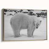 Framed wall art featuring a polar bear design on a textured canvas, set against a gold frame, showcasing a side view. Ideal for animal lovers and home decor enthusiasts.