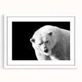 Polar bear wall art design featuring a striking illustration in a white frame with a mat, perfect for adding a touch of nature to home decor.