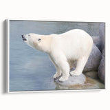 Framed canvas wall art showcasing a polar bear design with a white background, perfect for adding a touch of nature-inspired decor to any room. Ideal for wildlife enthusiasts and modern home aesthetics.