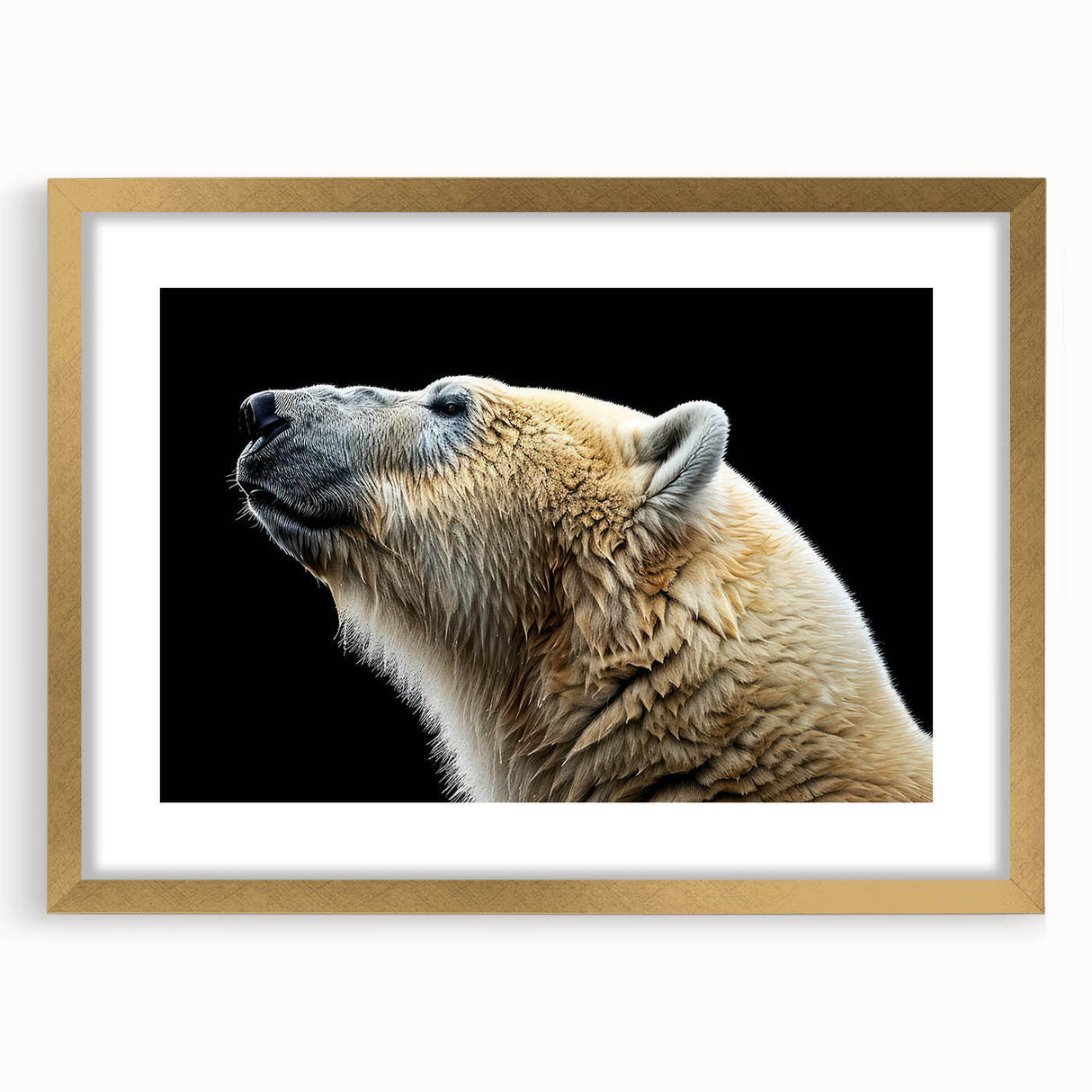 Polar bear wall art featuring a gold-framed design with a mat, showcasing a serene polar bear amidst a snowy landscape, perfect for winter-themed decor.