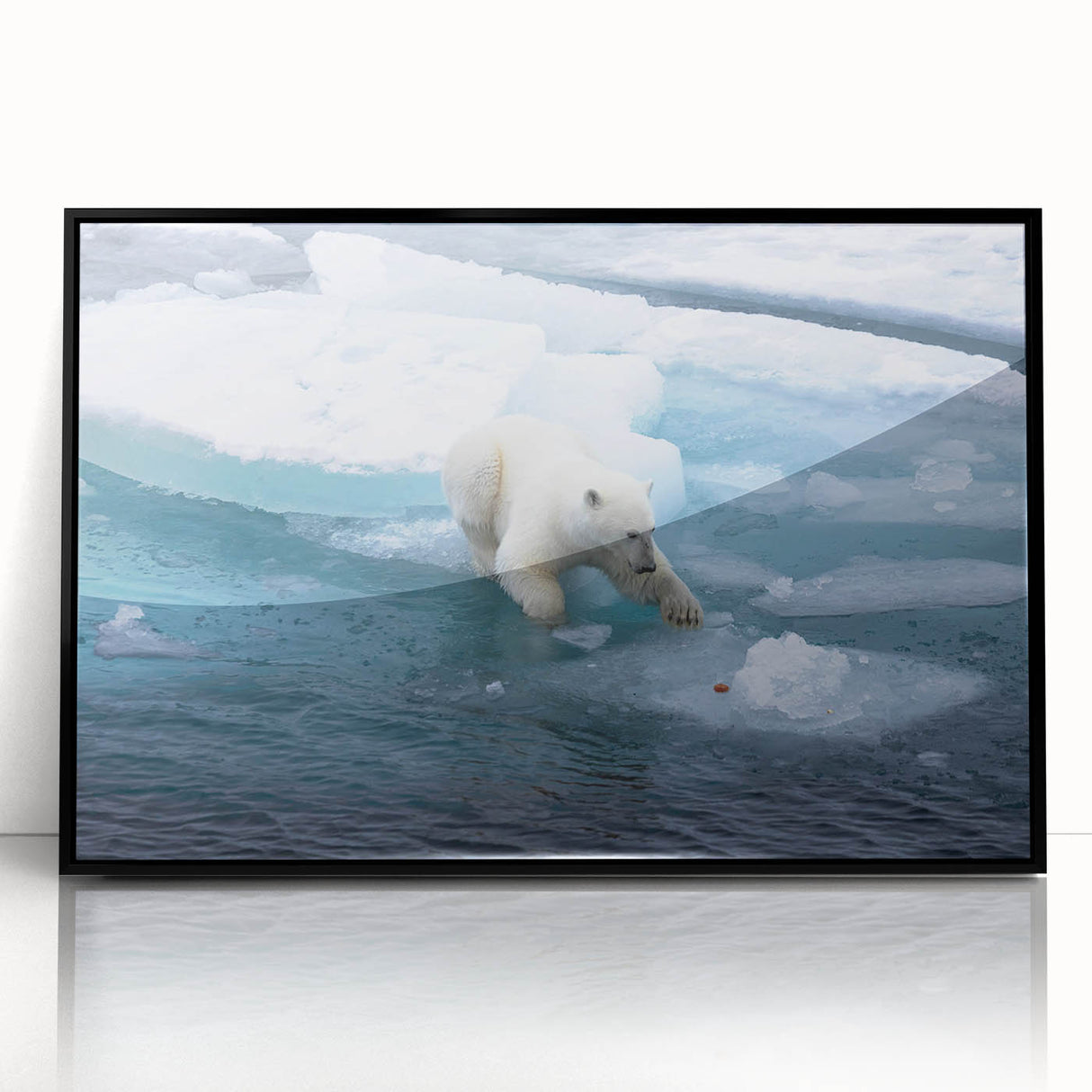 Framed wall art featuring a polar bear design, highlighted with a black frame and acrylic finish, perfect for enhancing modern home decor and wildlife themes.