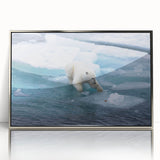 Framed wall art featuring a striking polar bear design set in a sleek silver frame, showcasing intricate details and vibrant colors, perfect for wildlife enthusiasts.