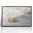 Framed acrylic wall art showcasing a striking polar bear design, featuring a sleek black frame and vibrant colors, perfect for home decor or wildlife enthusiasts.