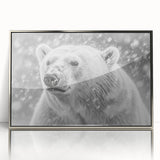 Framed wall art showcasing a polar bear design with a sleek silver border, highlighting its majestic features against a minimalist background. Perfect for wildlife enthusiasts and modern decor.