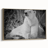 Framed canvas wall art featuring a modern polar bear design in a gold frame, showcasing intricate details and a sleek side view, perfect for contemporary decor.