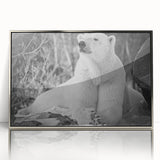 Framed polar bear wall art featuring a sleek silver border, showcasing a minimalist design with a striking polar bear illustration against a light background, perfect for modern decor.