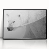 Framed wall art featuring a striking polar bear design in black and white acrylic, displayed in a sleek black frame, perfect for modern home decor.