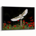 Framed canvas wall art showcasing a striking bird of prey design, featuring intricate details and a sleek black frame, perfect for modern home decor.
