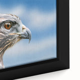 Close-up of a beautifully framed canvas artwork showcasing a vibrant design of birds, featuring intricate details and bright colors, perfect for home decor.