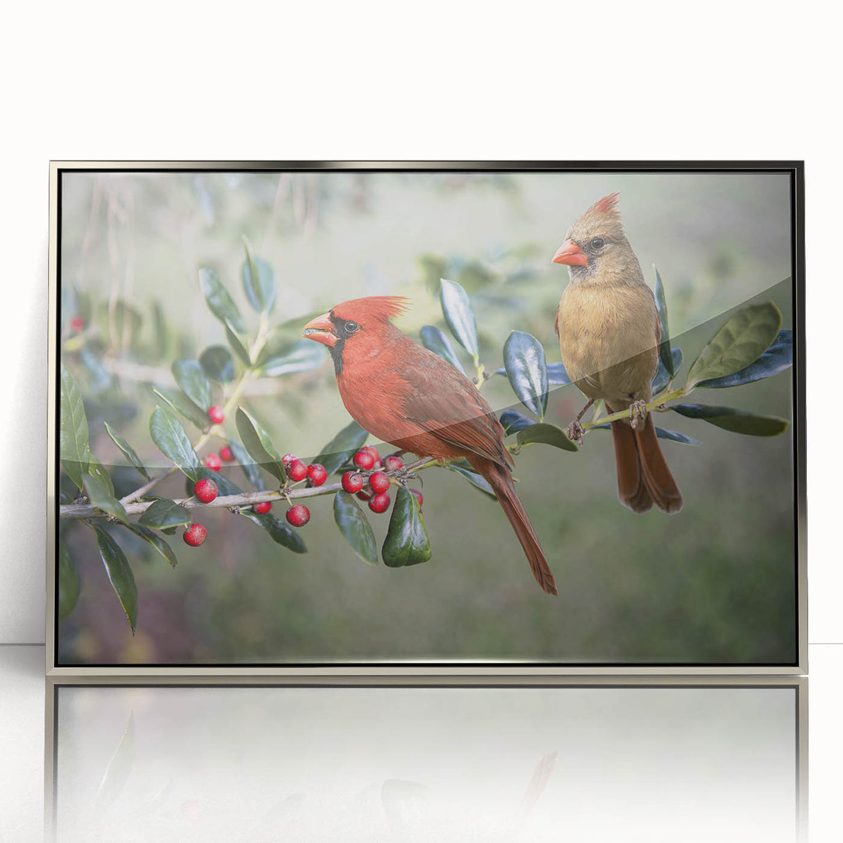 Framed wall art featuring a vibrant cardinal bird design, showcasing rich red and green colors with a sleek silver frame, perfect for nature lovers' decor.