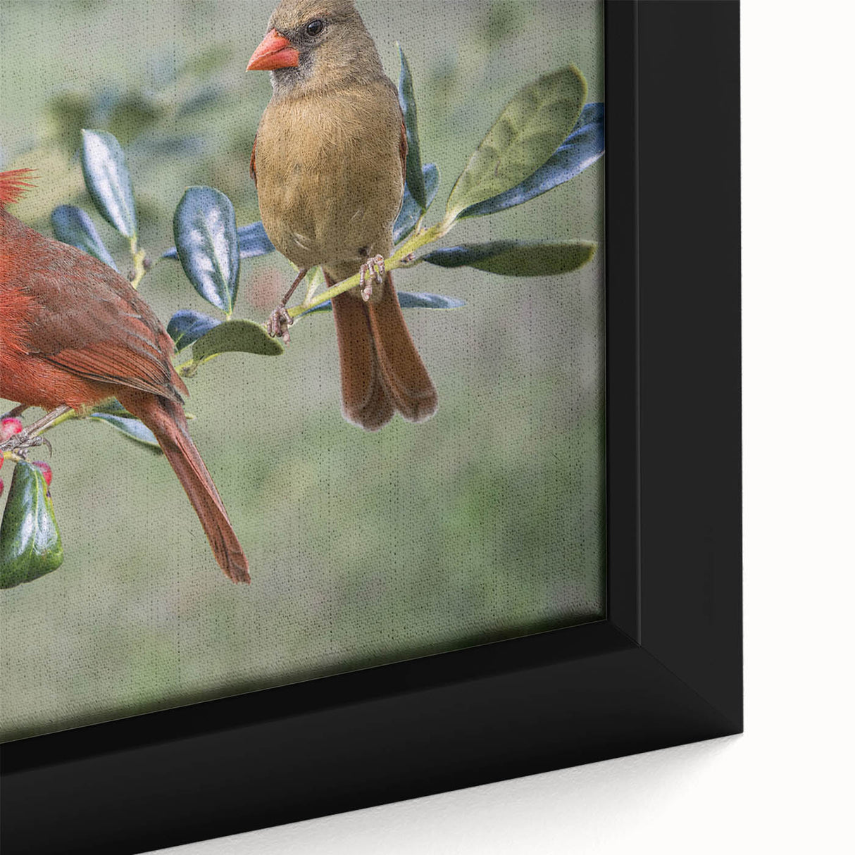 Close-up of a framed wall art piece showcasing a vibrant cardinal bird design, featuring rich reds and greens, perfect for enhancing home decor with nature-inspired elegance.