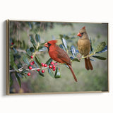 Framed canvas wall art featuring a vibrant cardinal bird design in striking red and gold hues, elegantly displayed with a sleek gold frame, perfect for home decor.