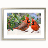Framed wall art showcasing a vibrant cardinal bird design, set in a silver frame with a white mat, perfect for home decor and nature enthusiasts.