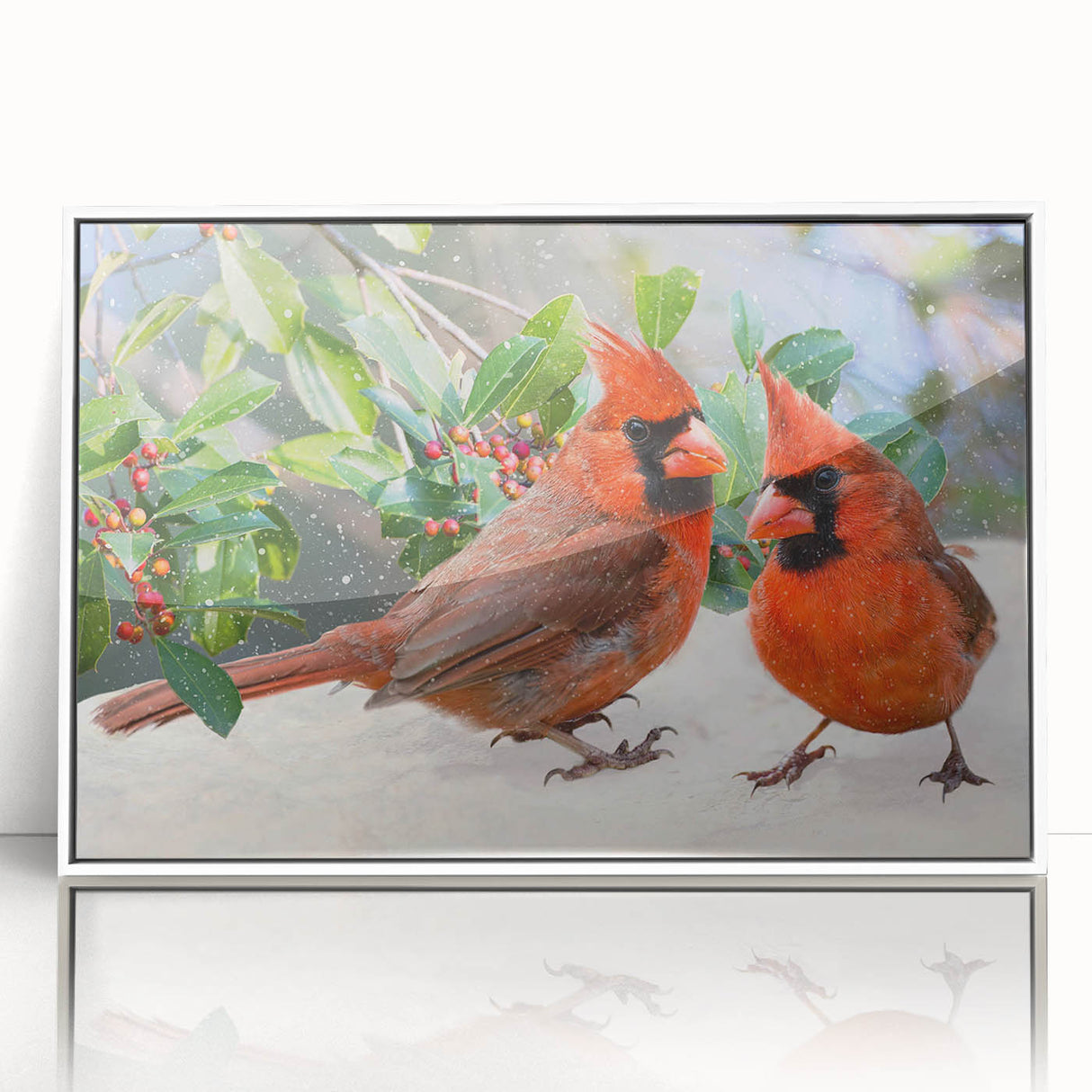 Framed wall art featuring a vibrant red cardinal perched on a branch, set against a soft white background, ideal for nature lovers and home décor enthusiasts.