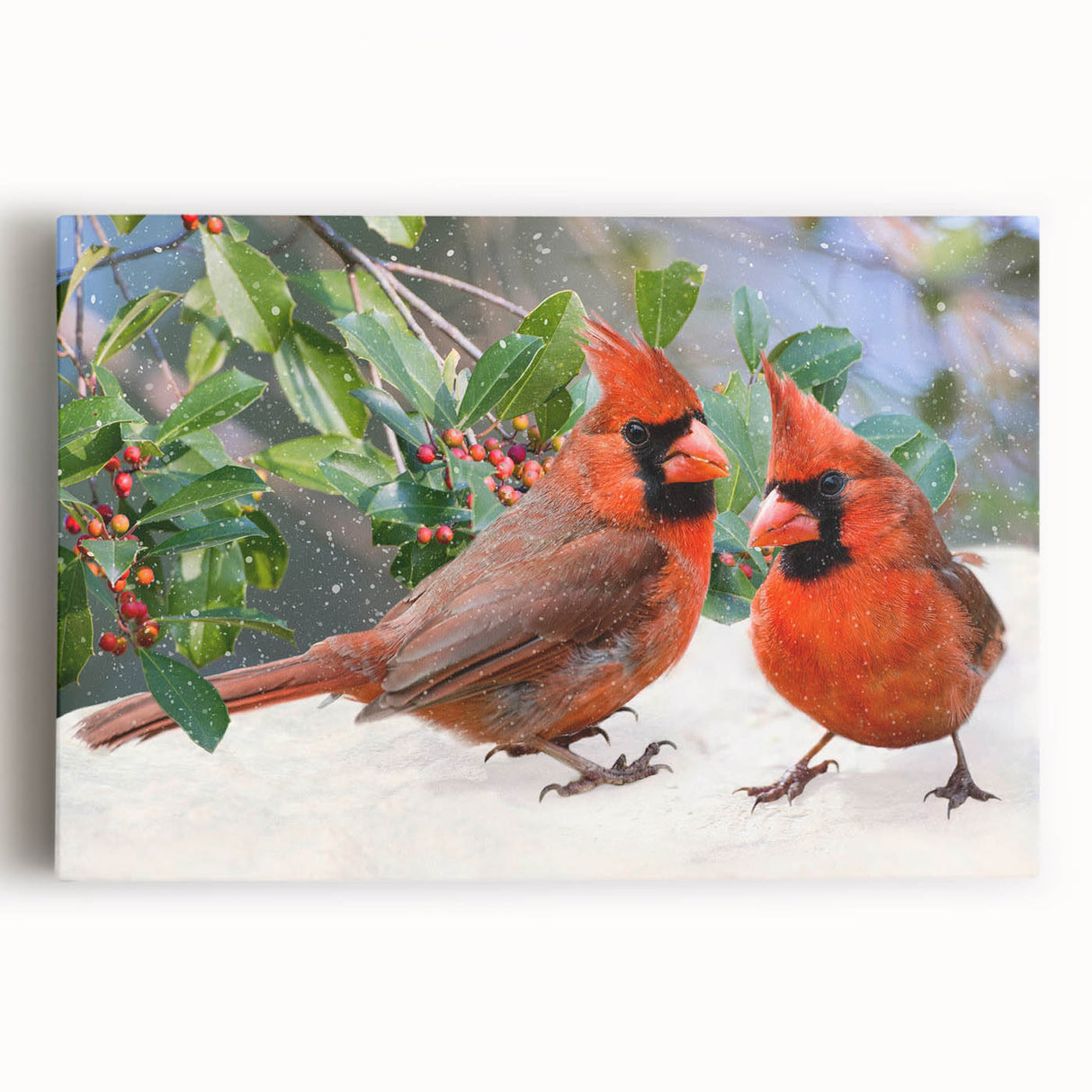 Vibrant stretched canvas wall art featuring a striking cardinal design, showcasing rich red and green colors on a natural backdrop, perfect for bird lovers and home decor enthusiasts.