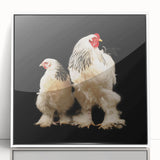 Framed wall art featuring a whimsical chicken design in vibrant colors, showcased in a sleek white frame, perfect for adding charm to any home decor.