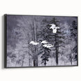 Framed wall art featuring a stunning crane design on canvas, showcasing intricate details and vibrant colors, displayed at a slight angle against a black background. Perfect for modern decor.