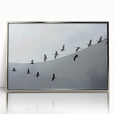 Framed wall art featuring a silver-accented crane design, elegantly displayed in an acrylic frame. Ideal for modern home decor, adding a touch of sophistication.