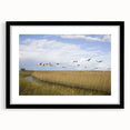 Black-framed wall art featuring an elegant crane design, showcasing intricate details and vibrant colors, perfect for enhancing contemporary home decor.