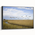 Framed wall art featuring a black crane design on canvas, showcasing intricate details and textures, perfect for modern home decor. The side view highlights its elegant frame and artistic appeal.