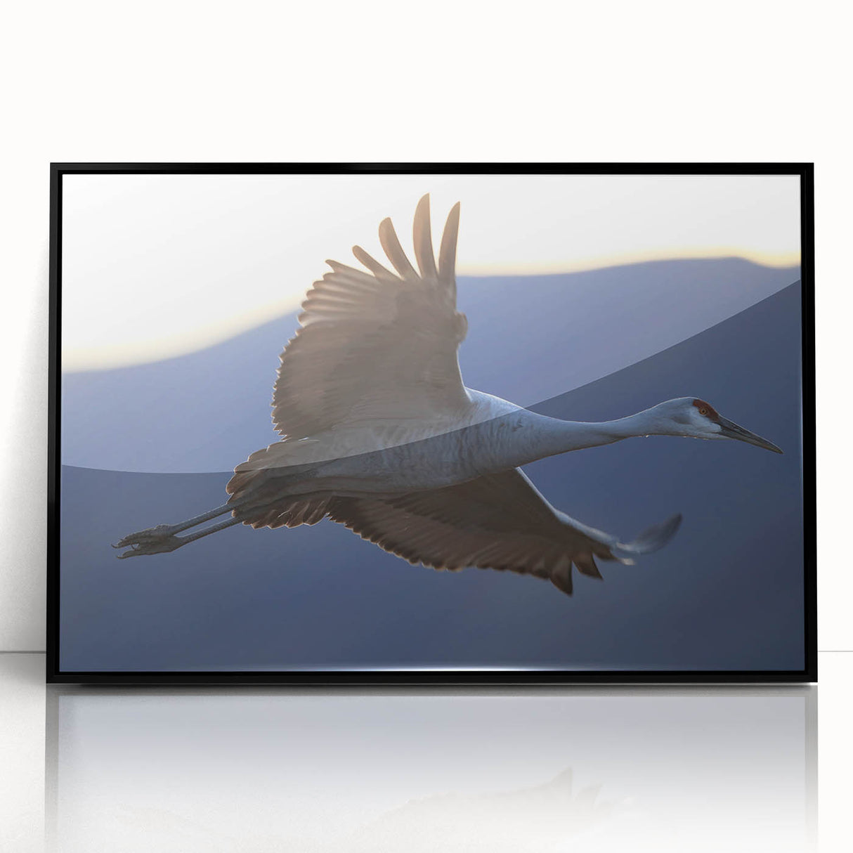 Framed wall art featuring a black crane design on an acrylic surface, showcasing elegant lines and modern aesthetics, ideal for contemporary home decor.