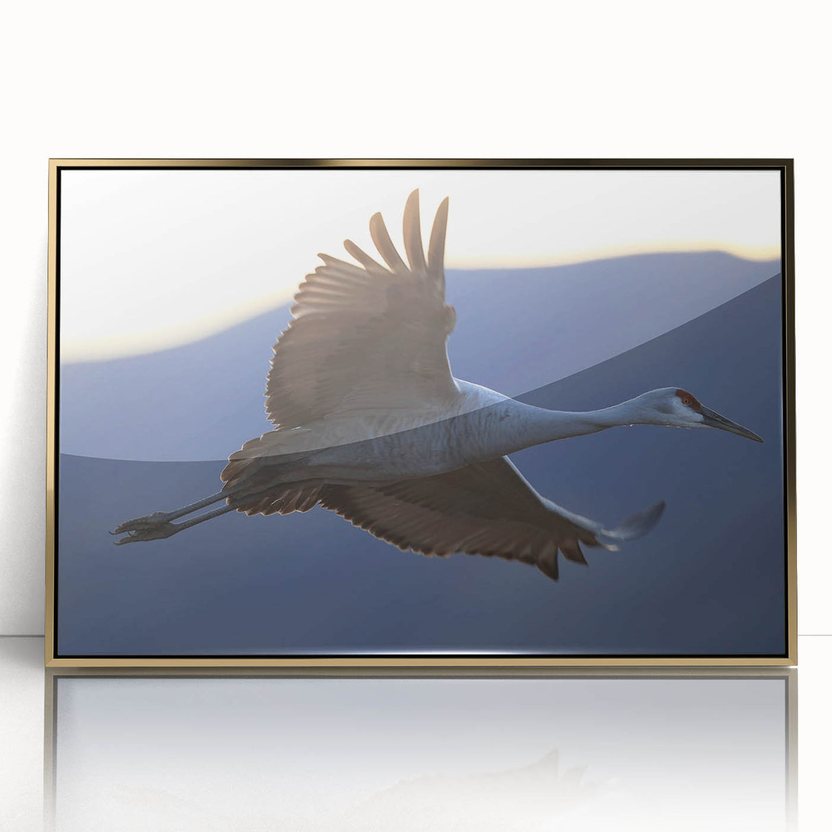 Framed wall art showcasing an elegant crane design with a gold-accented acrylic front, perfect for adding a touch of sophistication to modern decor.