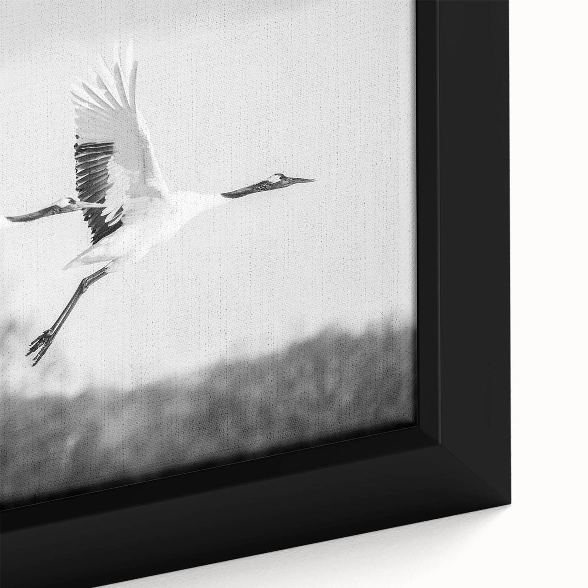 Close-up of a framed canvas wall art piece showcasing an elegant crane design in soft hues of blue and gold, perfect for enhancing modern home decor.