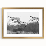 Elegant wall art featuring a crane design in a gold frame with a mat, showcasing intricate details and a sophisticated aesthetic, perfect for home decor.