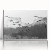 Framed wall art featuring a serene crane design in a minimalist style, showcased in a sleek white frame, perfect for modern decor and nature enthusiasts.
