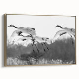Framed wall art featuring an elegant crane design in gold tones, showcasing a contemporary aesthetic with a side view that highlights the intricate details and craftsmanship of the piece. Ideal for modern home decor and art enthusiasts.