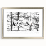 Framed wall art collection showcasing elegant crane design in silver frame, featuring a mat for added depth, perfect for modern home decor.