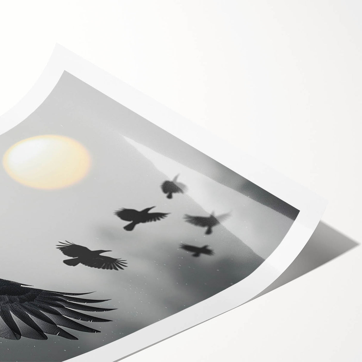 Artistic rolled print showcasing a crow and raven design, highlighting intricate details and rich black tones, perfect for modern wall decor.