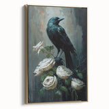 Framed wall art featuring a striking design of a crow and raven, showcasing rich black feathers and intricate details, set against a minimalist background with a gold frame, ideal for modern decor.