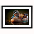 Black-framed wall art featuring a vibrant duck design, set within a stylish mat, showcasing a modern aesthetic perfect for home decor enthusiasts.
