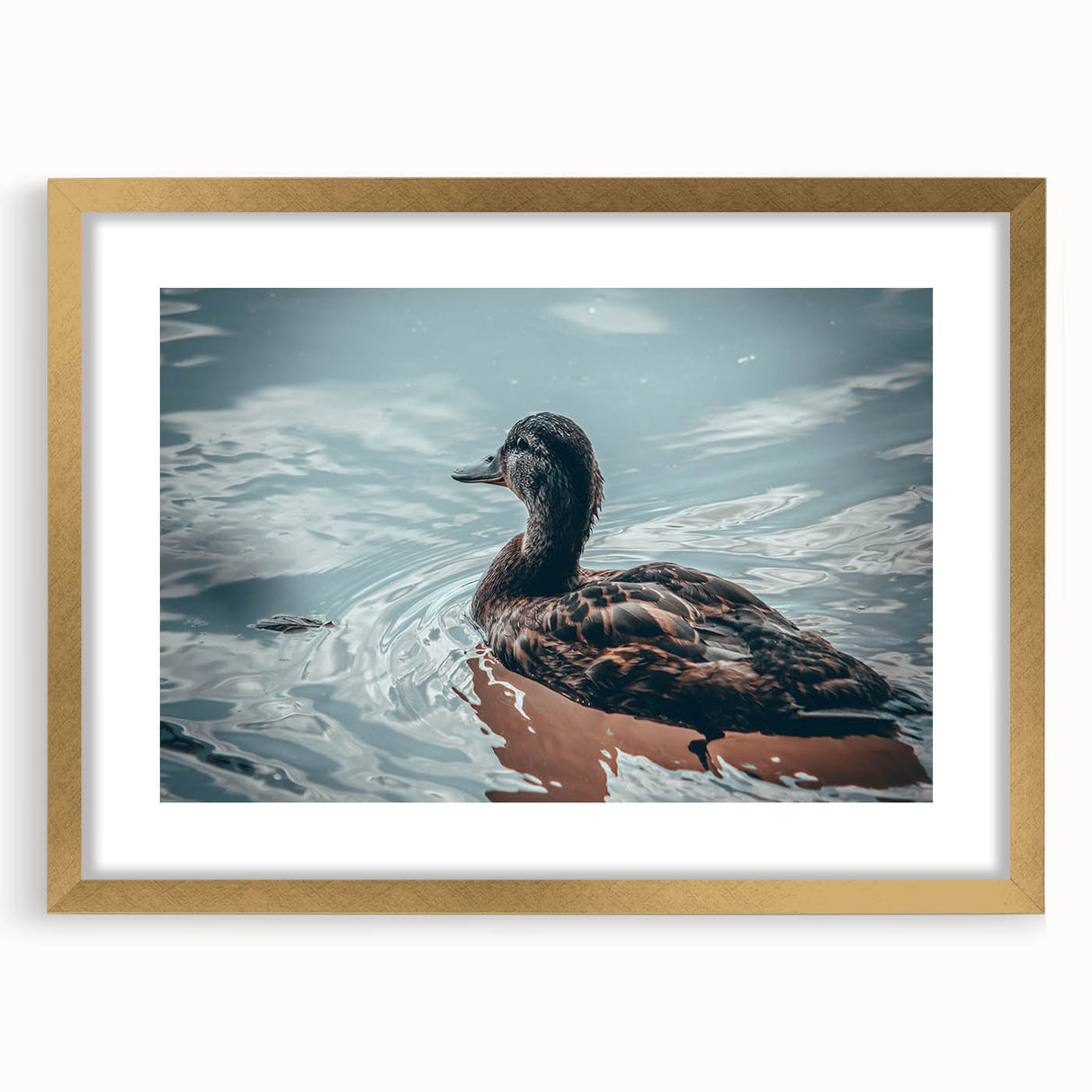 Elegant wall art featuring a duck design in a gold frame with a mat, showcasing vibrant colors and intricate details against a clean background, perfect for home decor.