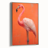 Framed canvas artwork showcasing a vibrant flamingo design, elegantly displayed with a silver frame, ideal for enhancing modern home decor. The artwork features soft pink tones and intricate details, bringing a touch of nature indoors.