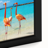 Close-up of a vibrant framed canvas wall art featuring elegant flamingo designs in pink and teal hues, perfect for adding a tropical touch to home decor.