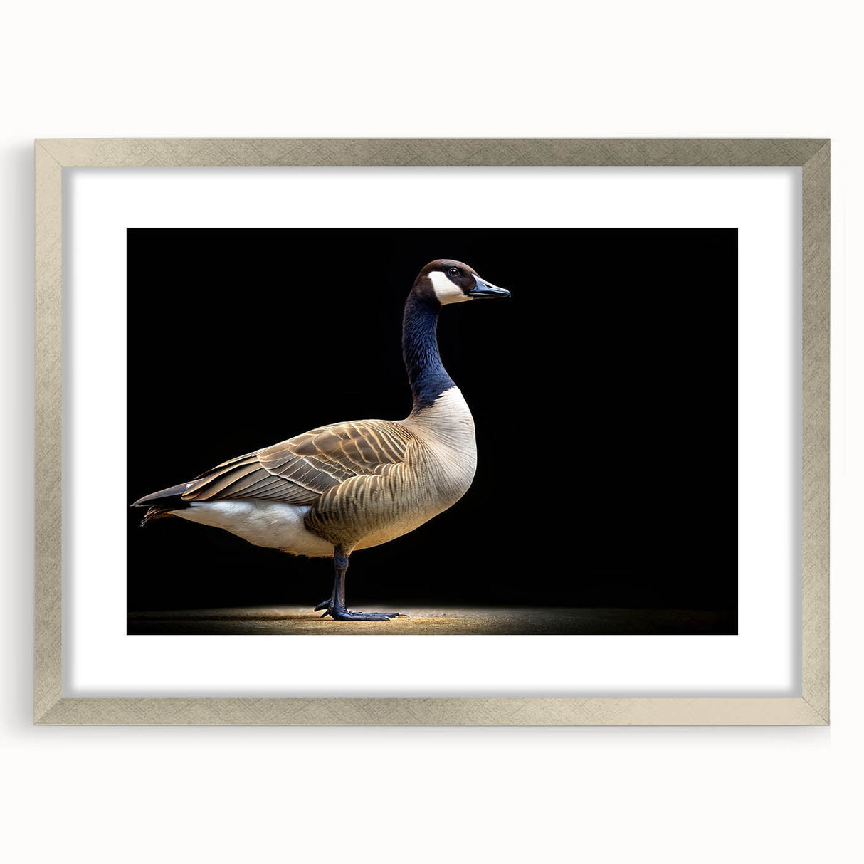 Framed wall art featuring a silver mat and a design of elegant geese in flight, perfect for enhancing home decor with a touch of nature and tranquility.
