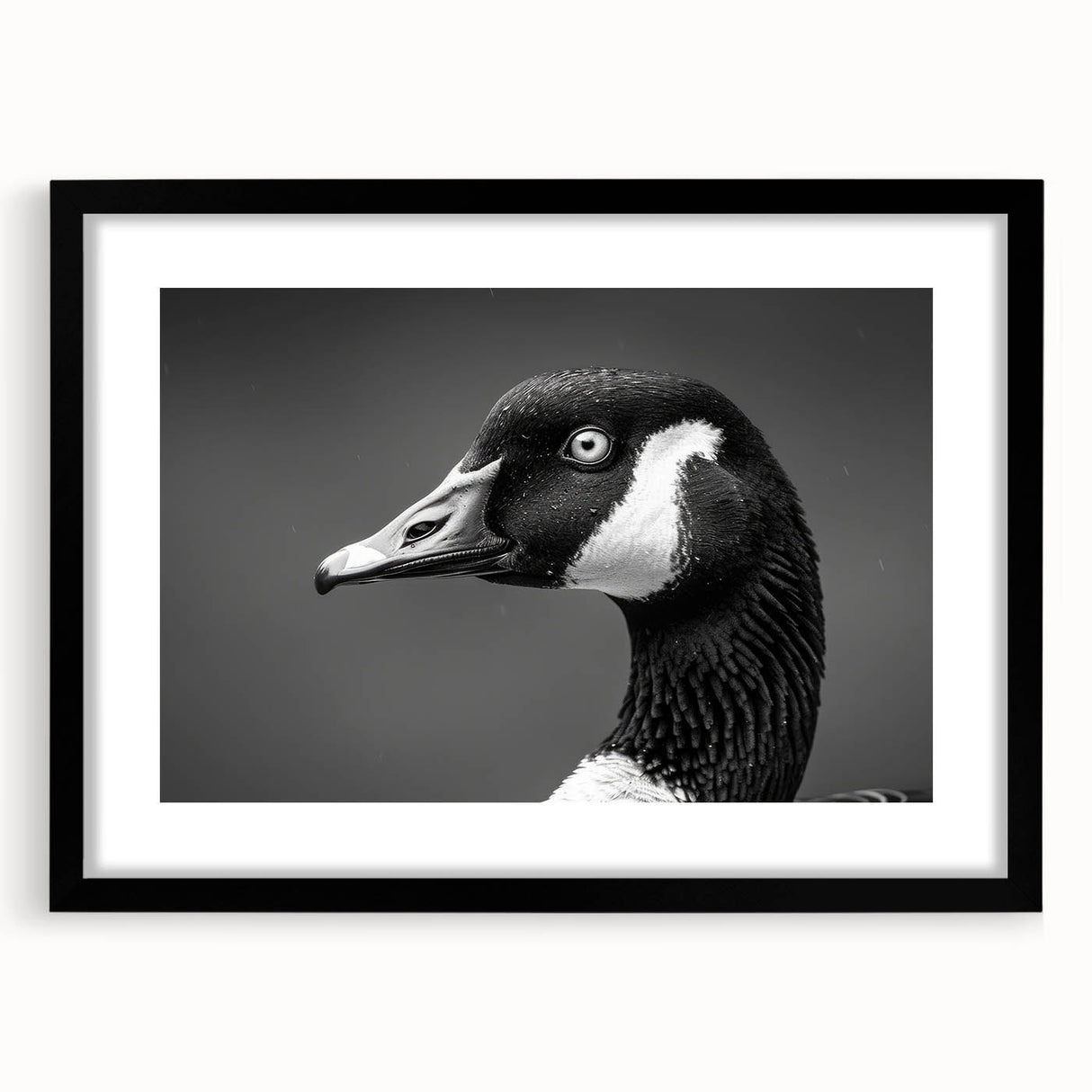 Framed wall art featuring a stylish goose design in a black frame, showcasing intricate details and modern aesthetics, perfect for home decor enhancement.