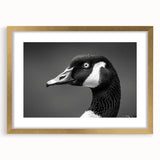 Gold-framed wall art featuring elegant goose designs, showcasing intricate details and a sophisticated mat. Ideal for enhancing modern home decor.